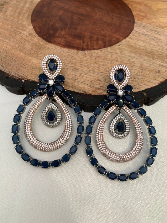 American Diamond Blue Stone Oval Triple Layer Dual Tone Earrings