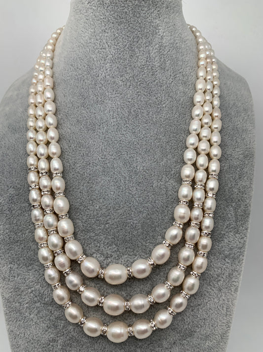 Three line Real Oval Kalgi Pearls Mala with Chakri and Gradiant Sized Pearls