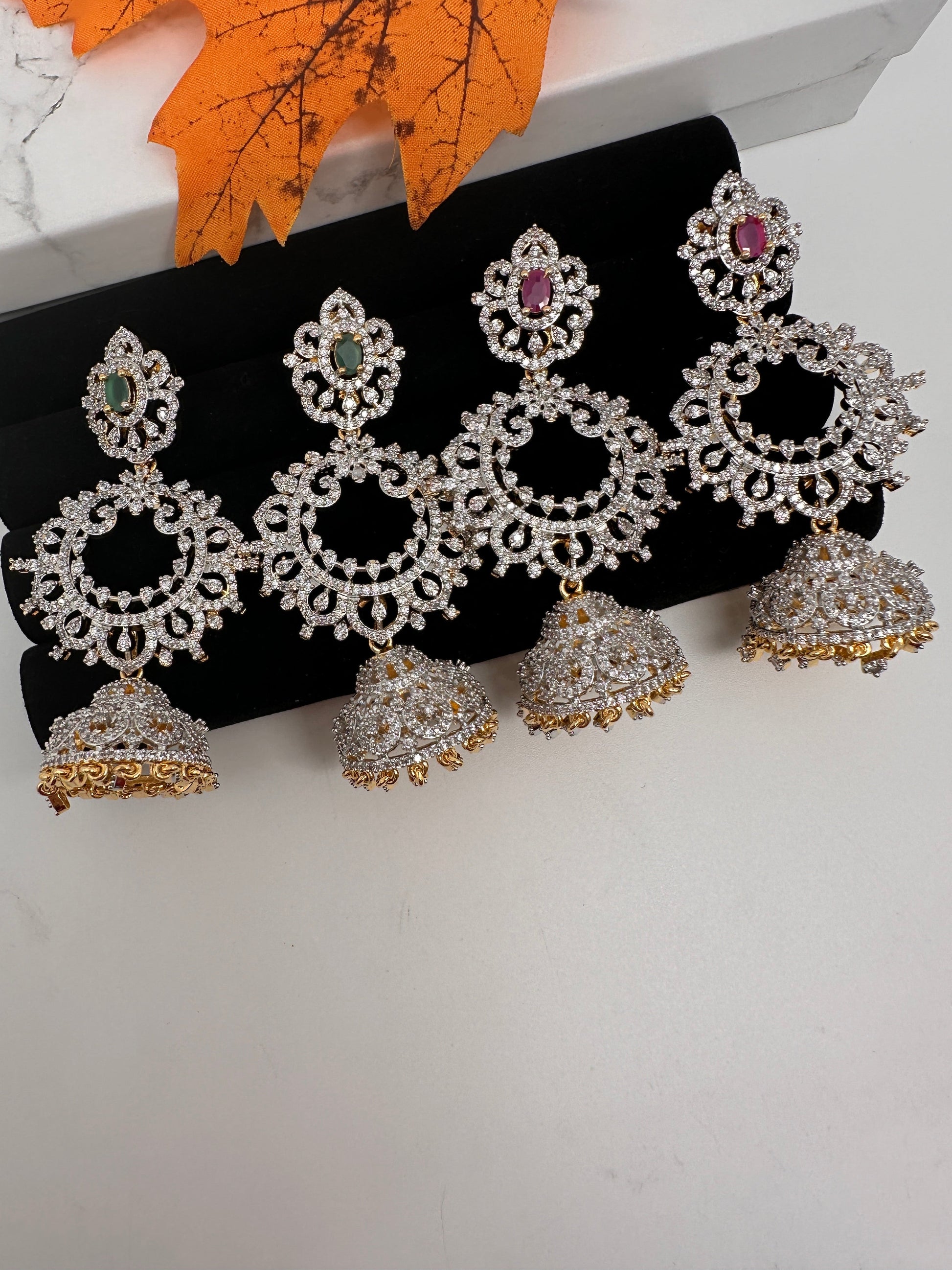 Diamond Finish Color Stone Jhumka Earings - Green