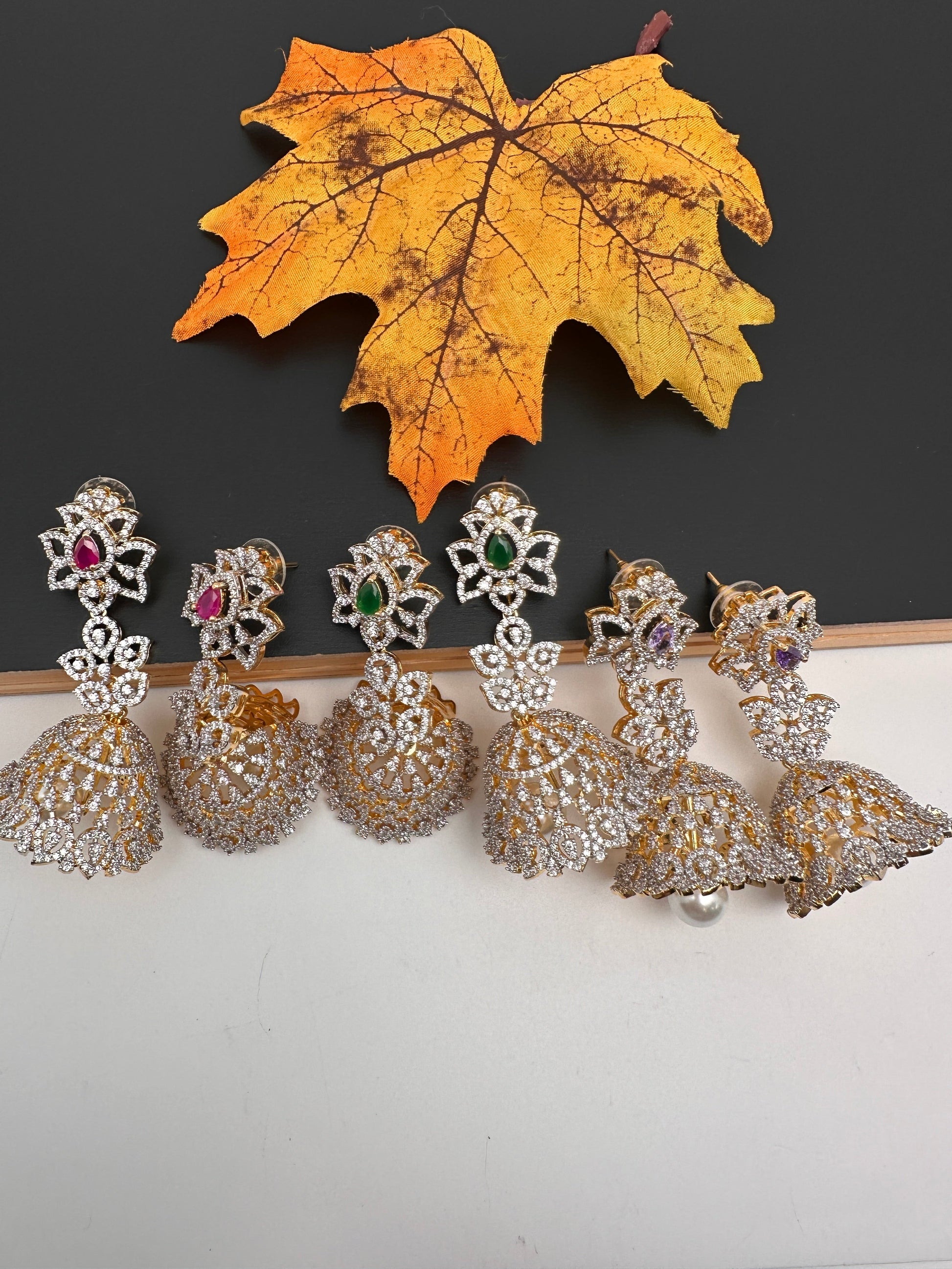 Diamond Color Stone Jhumka Earings - Green