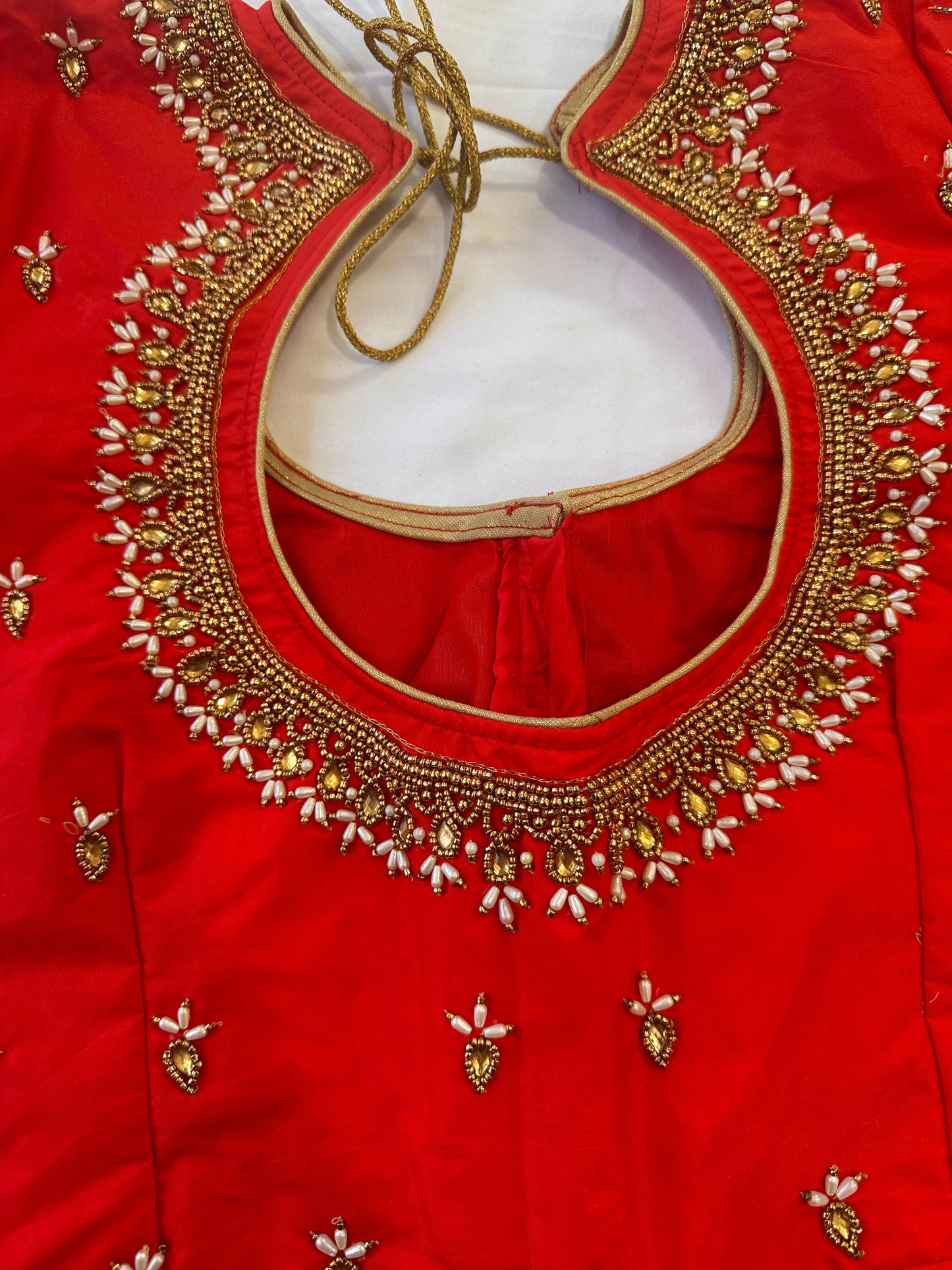 Orangish Red Maggam work blouse