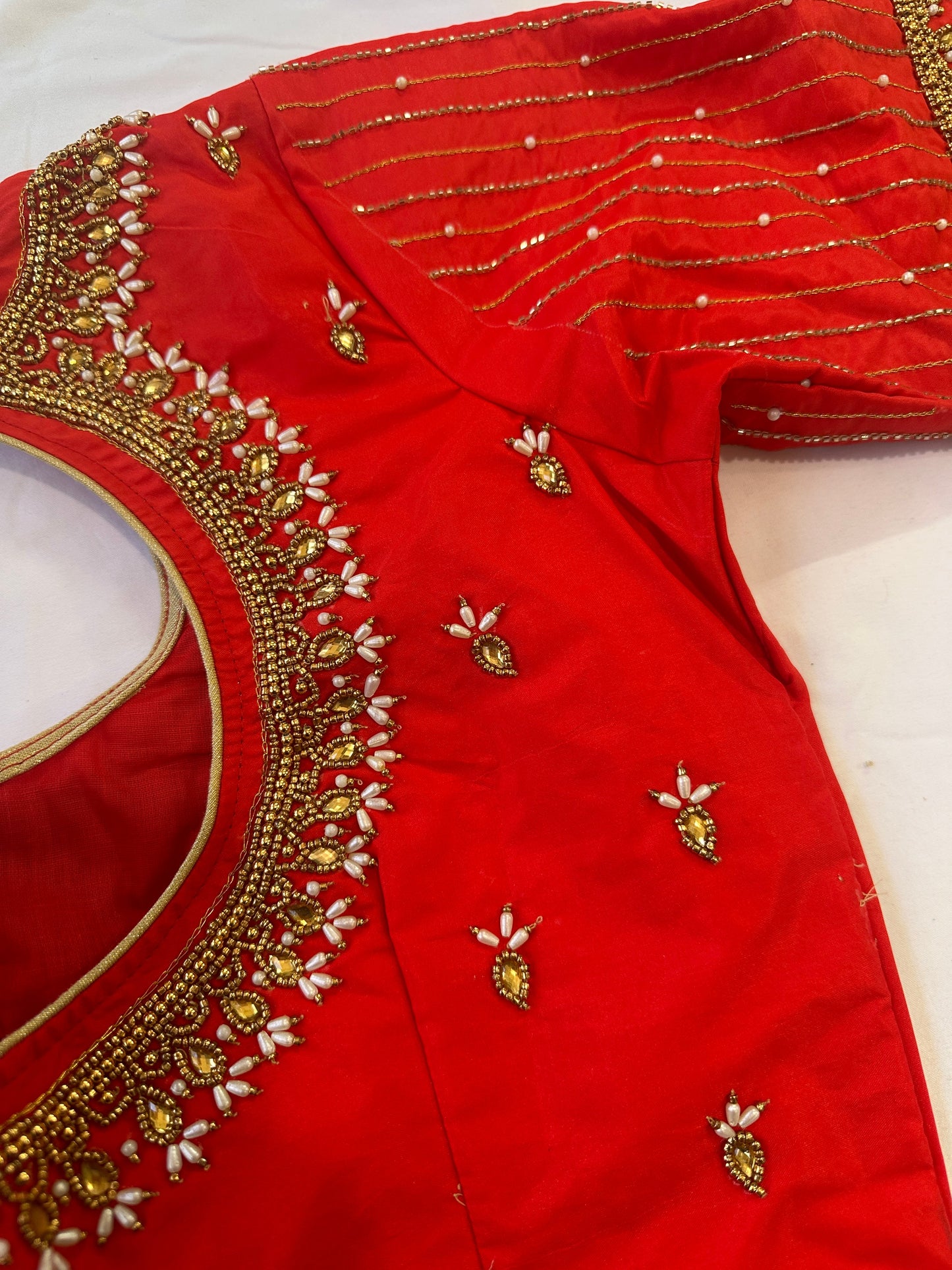 Orangish Red Maggam work blouse