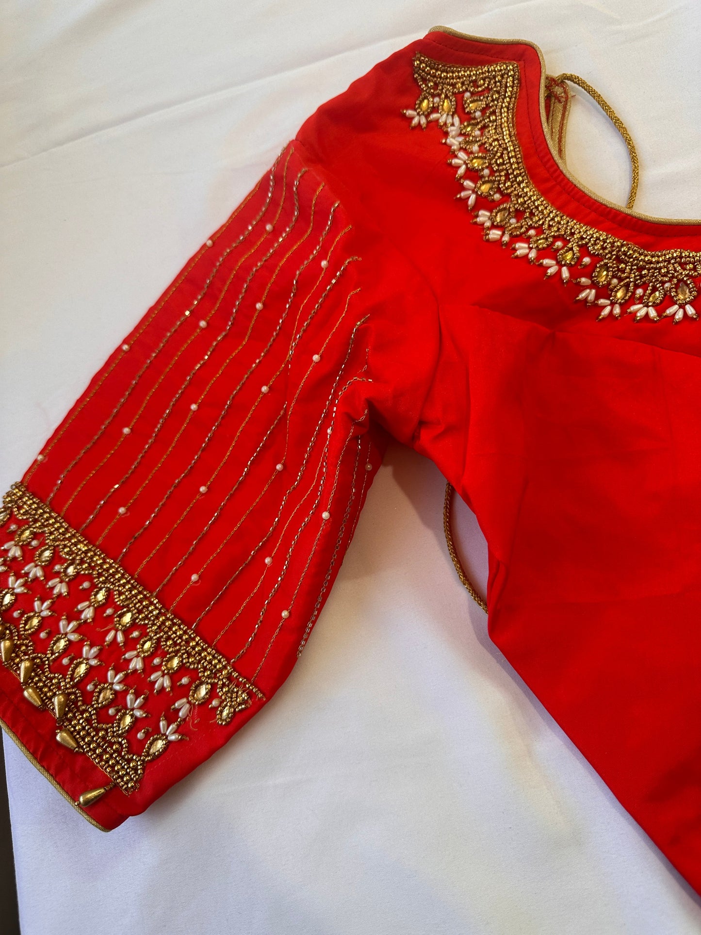 Orangish Red Maggam work blouse