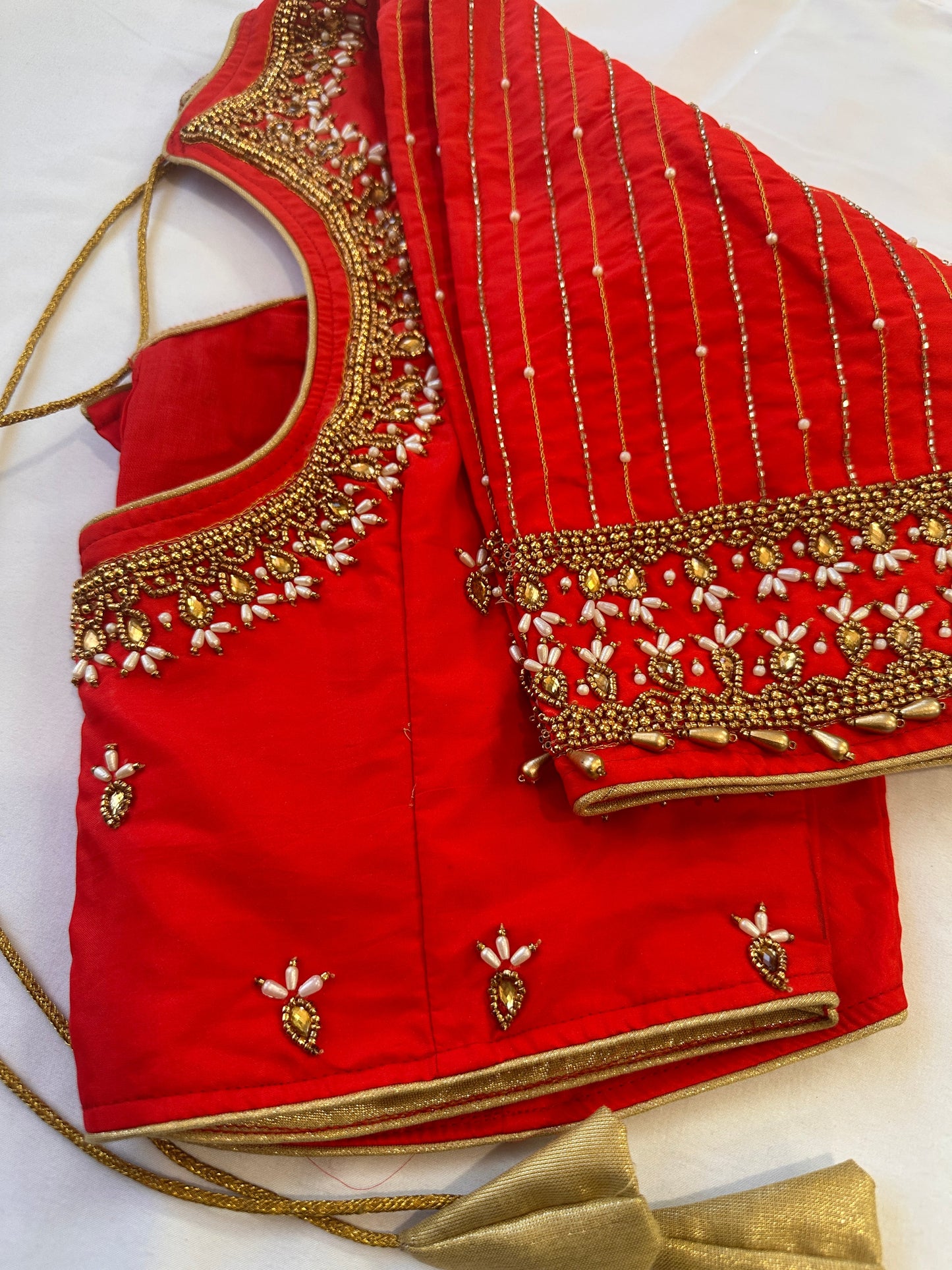 Orangish Red Maggam work blouse