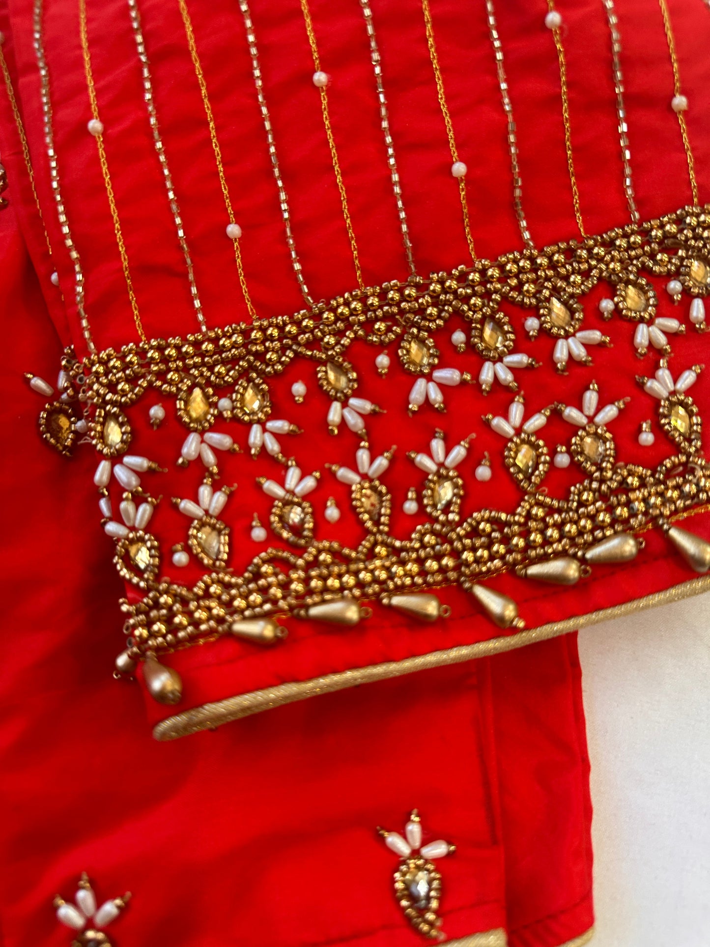Orangish Red Maggam work blouse