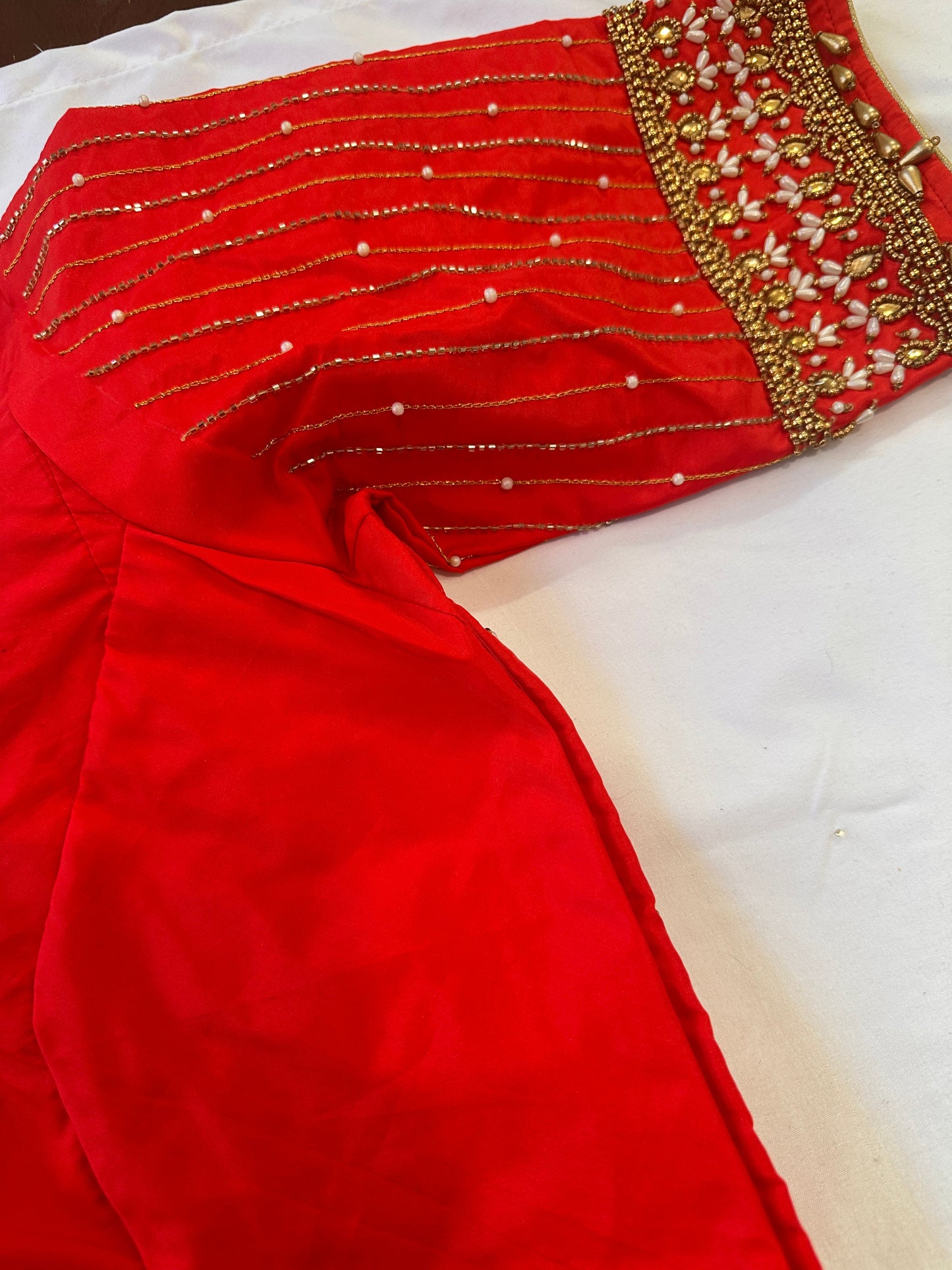 Orangish Red Maggam work blouse