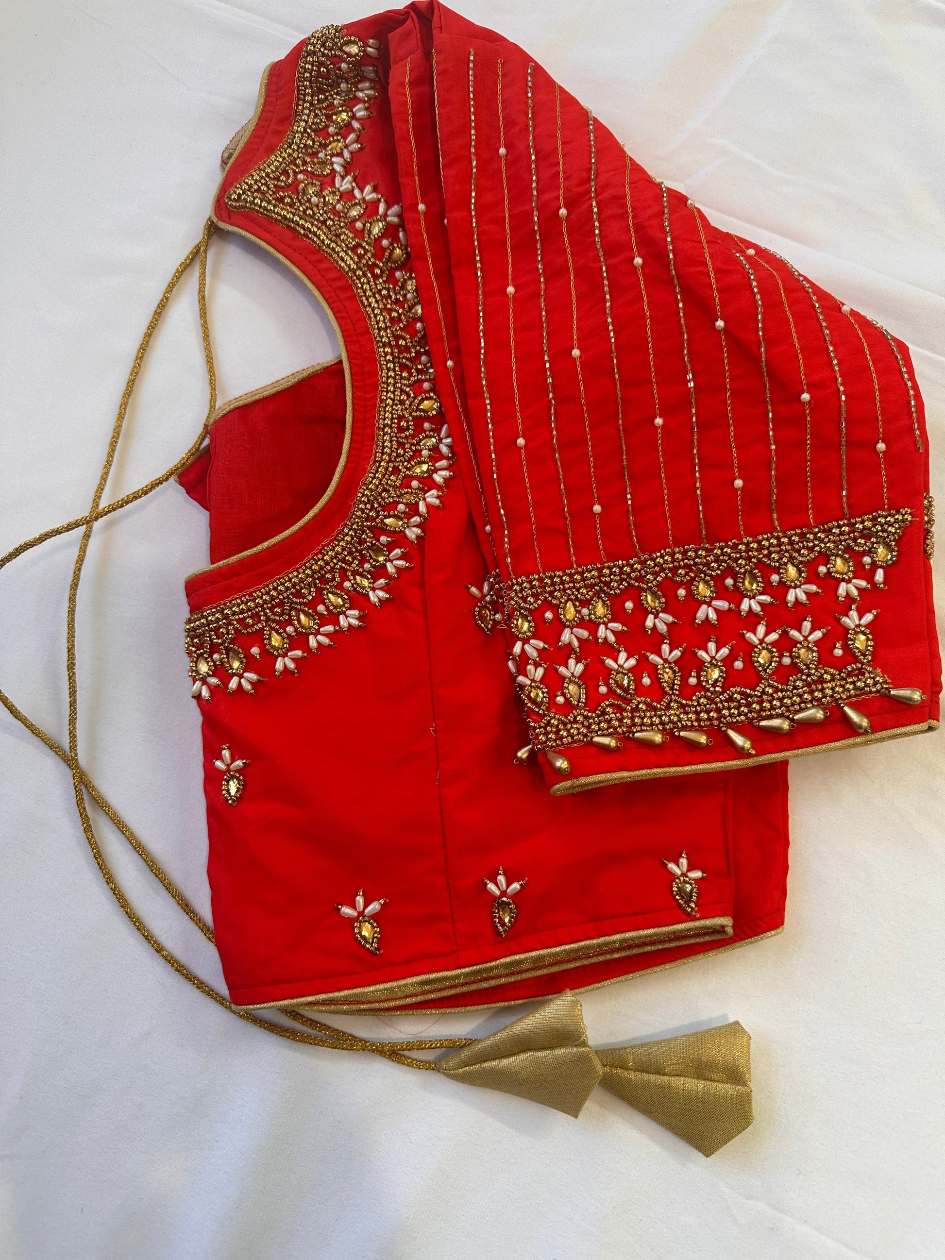 Orangish Red Maggam work blouse