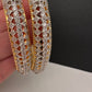 Elegant golden AD kada bangles for festive occasion wear