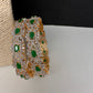 AD diamond finish green stone bangles - openable pair