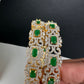 Golden openable AD bangles with green stones for weddings