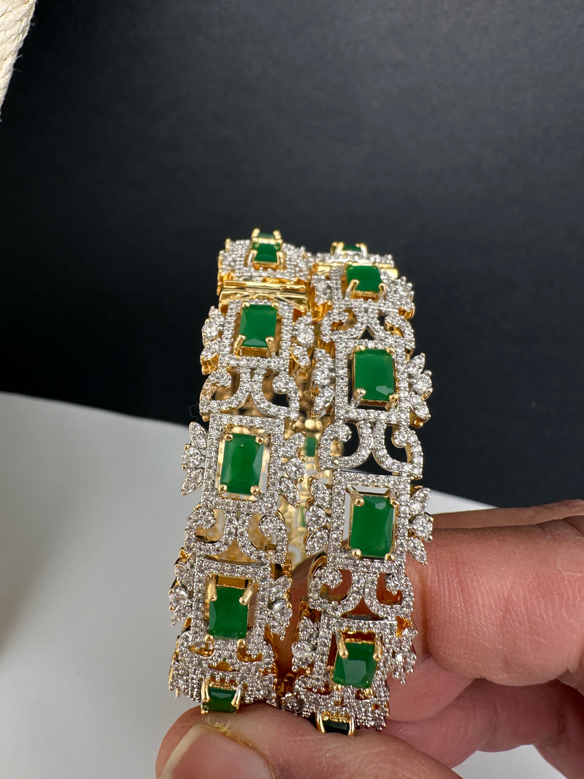 Golden openable AD bangles with green stones for weddings