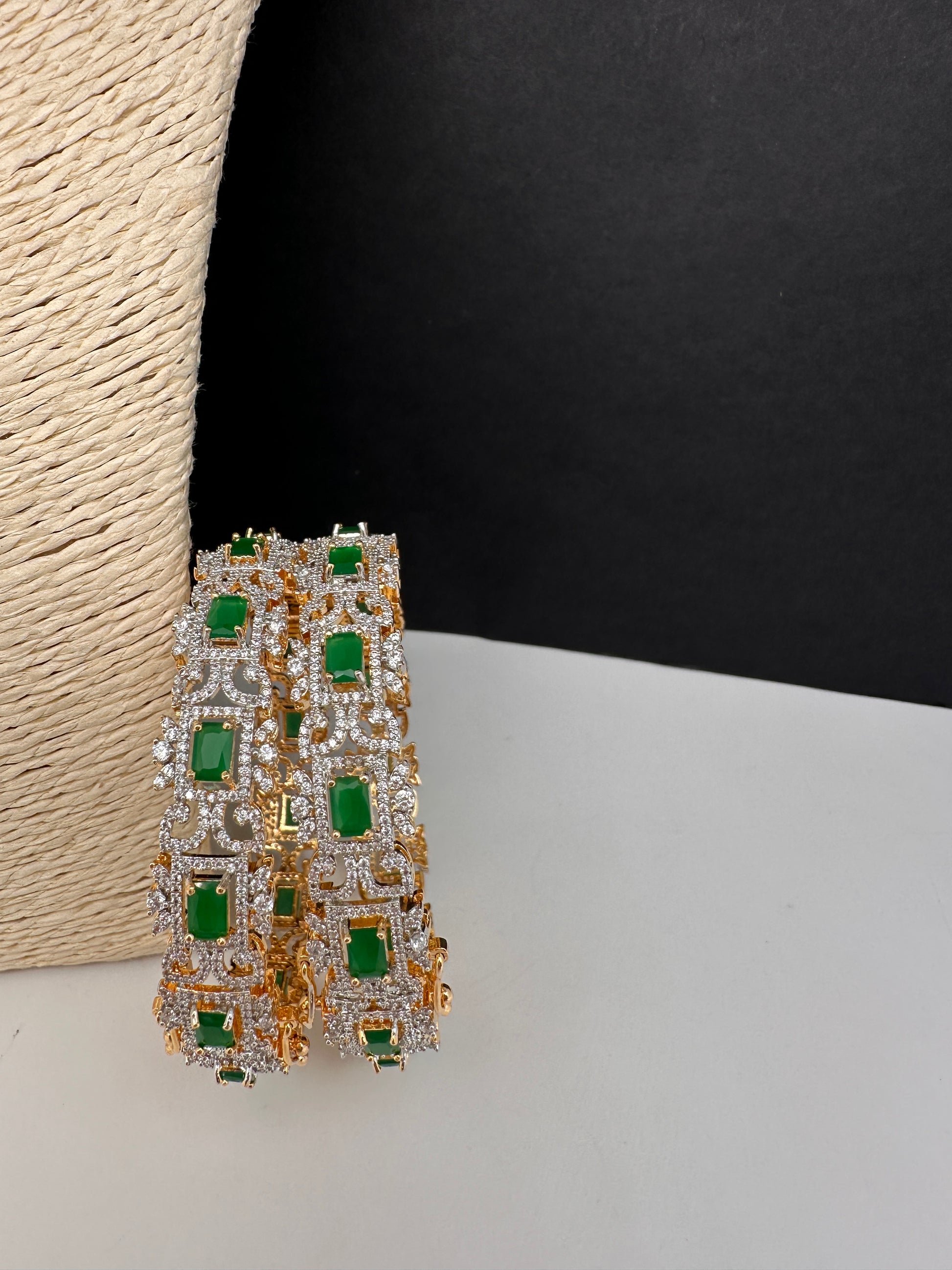 Emerald green AD bangles in golden finish - festive jewelry pair