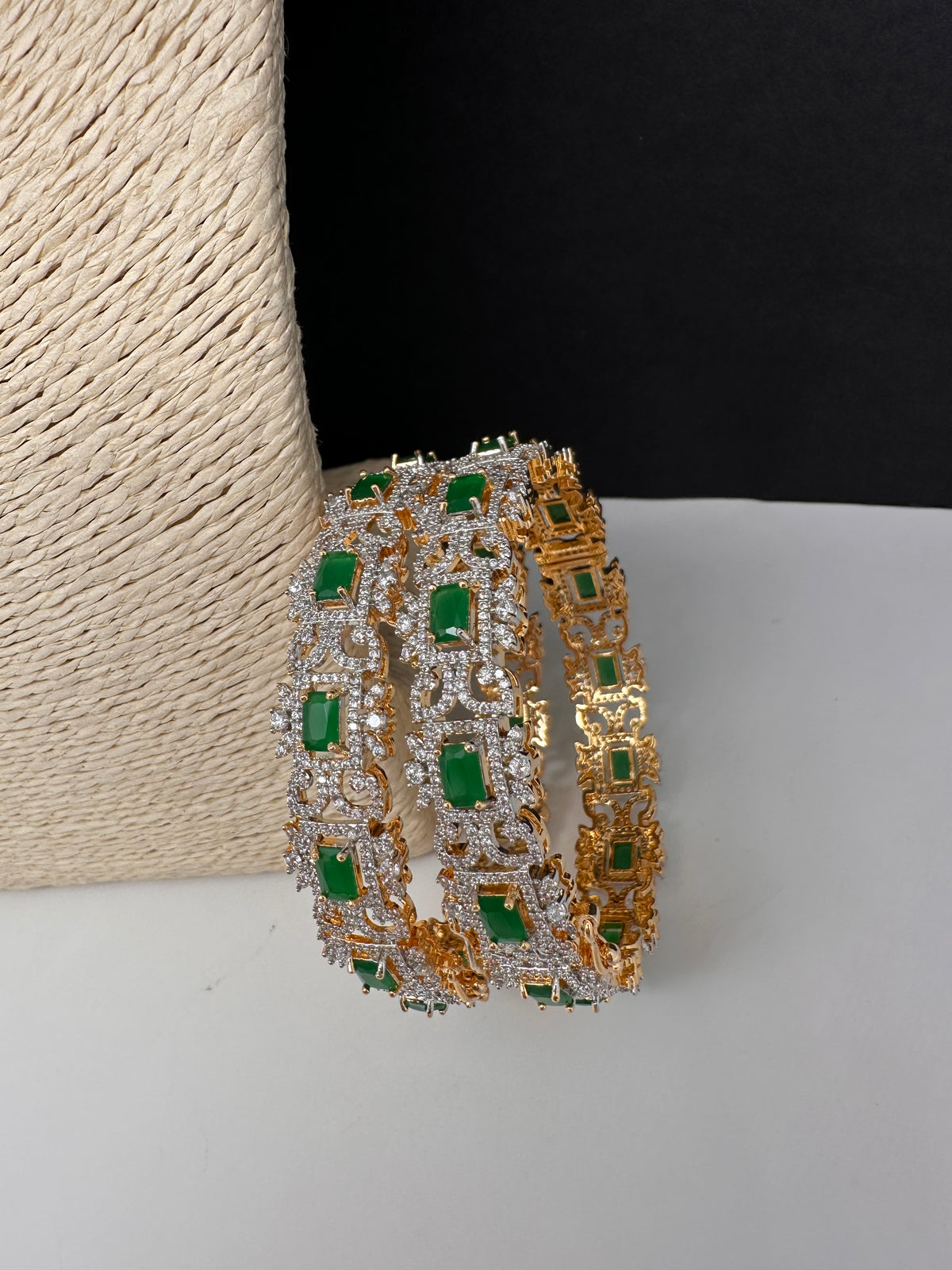 AD emerald green openable bangles pair in golden finish