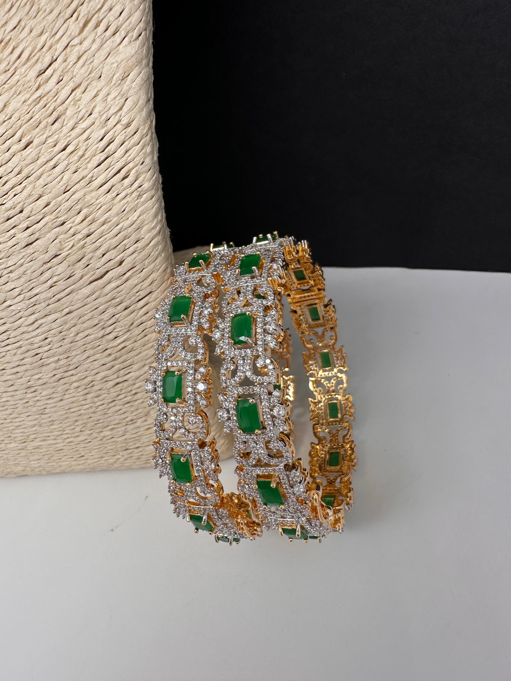 AD emerald green openable bangles pair in golden finish