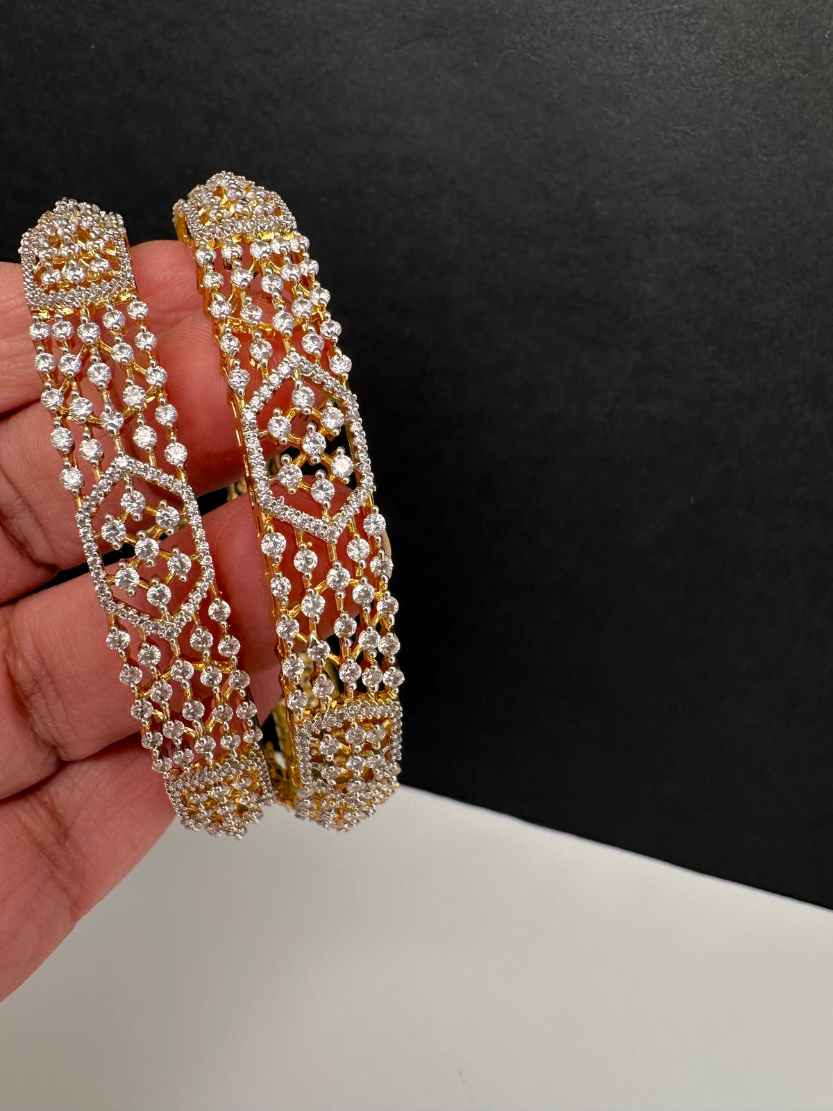 AD stone openable kada bangles in golden finish - pair