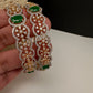 Golden floral AD green stone bangles for Indian weddings