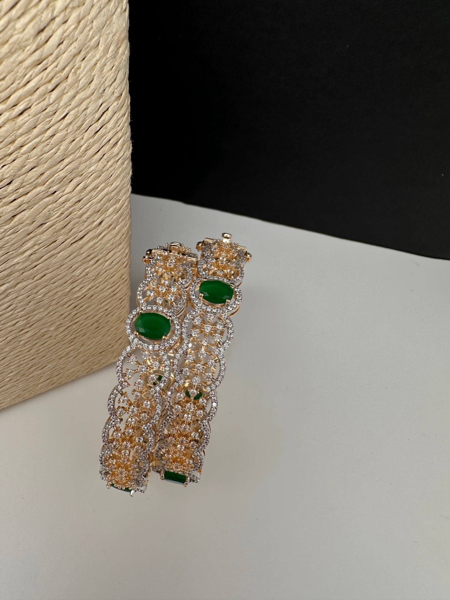 AD floral emerald green openable bangles pair - golden finish
