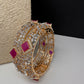 Diamond finish ruby AD bangles with red stones in gold finish