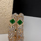 Golden openable AD green stone bangles for weddings and festivals