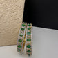 Elegant golden emerald green AD bangles - festive jewelry pair