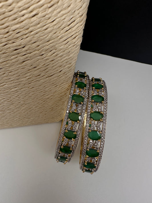 AD emerald green stone bangles pair in golden finish