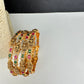 Set of 4 Sleek Goddess Lakshmi Bangles in CZ Red and Green Stones - 2.8