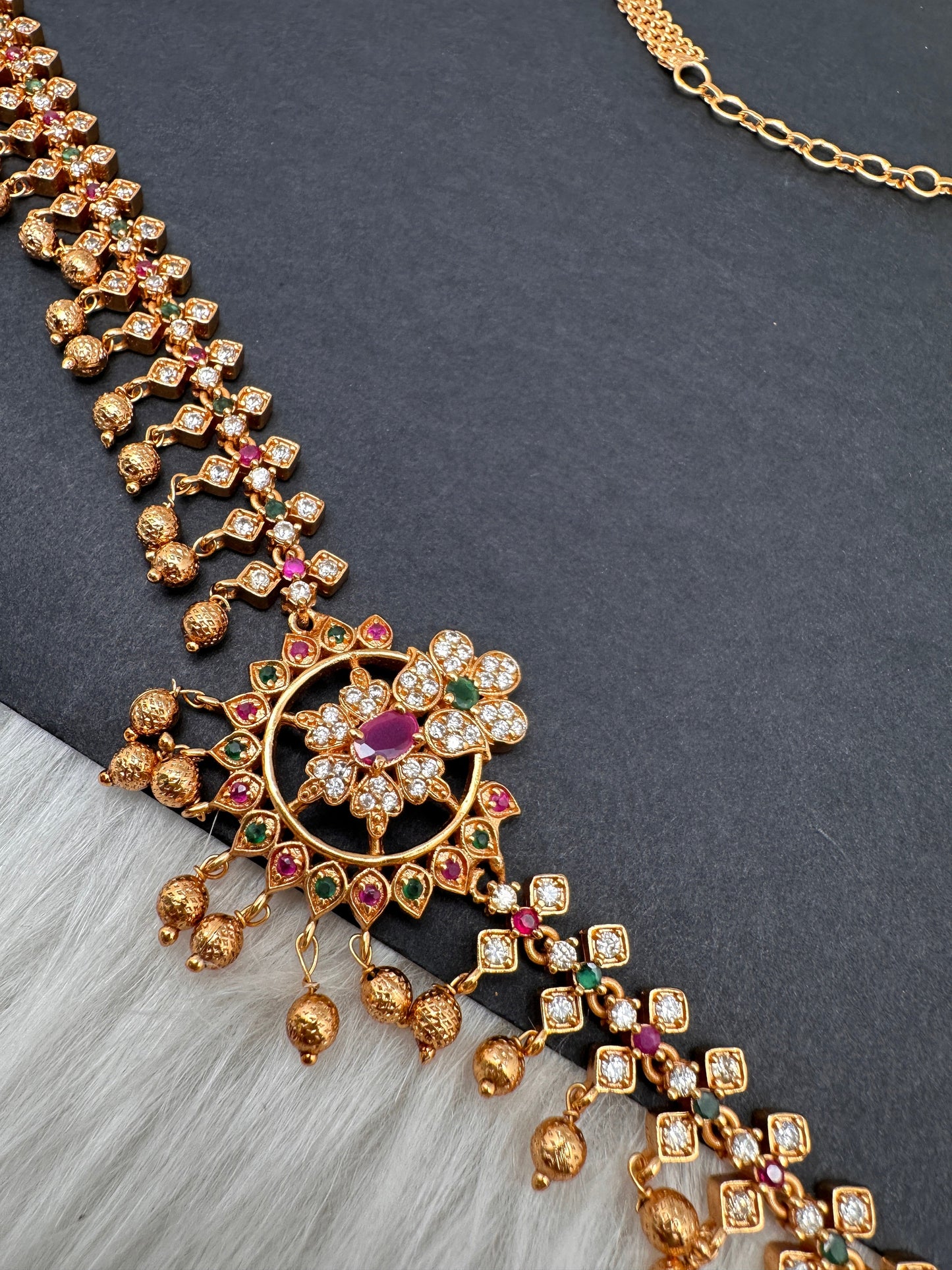 Sleek CZ Red Green Multi Stone Matte Finish Floral Pattern Hip Chain Vaddanam