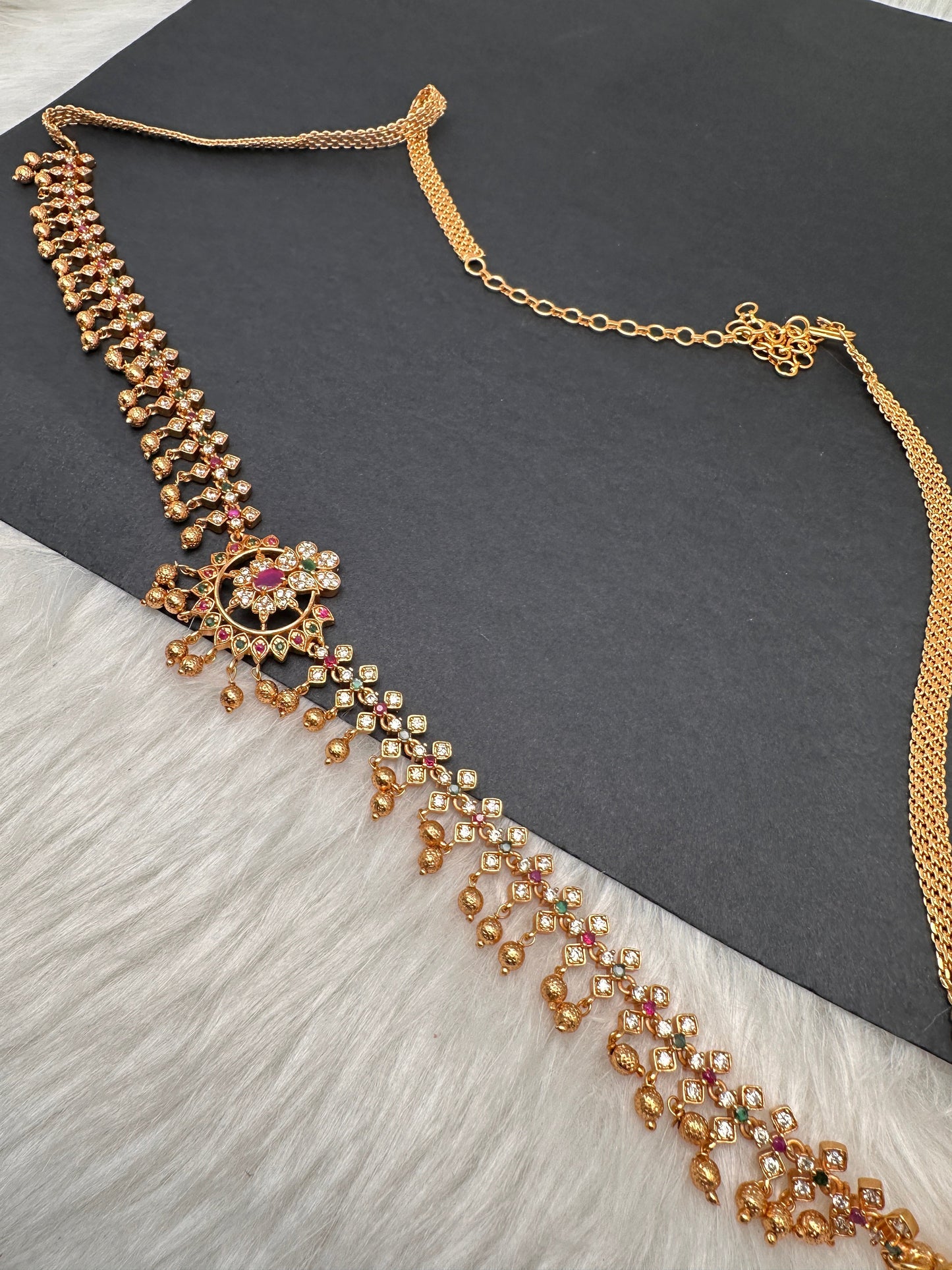 Sleek CZ Red Green Multi Stone Matte Finish Floral Pattern Hip Chain Vaddanam