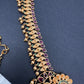 Sleek Red Kemp Green Stone Matte Finish Floral Design Hip Chain Vaddanam