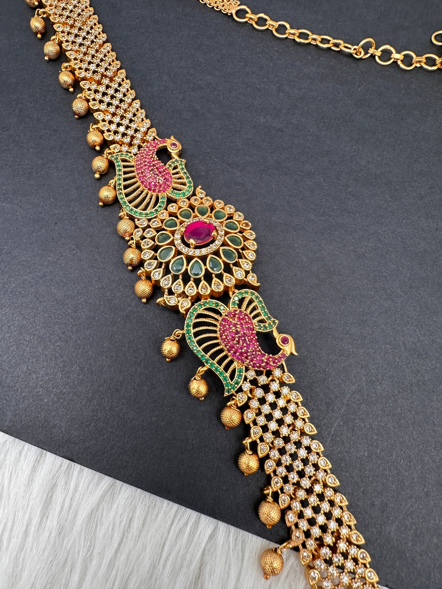 Sleek CZ Red Green Multi Stone Matte Finish Peacock Design Hip Chain Vaddanam