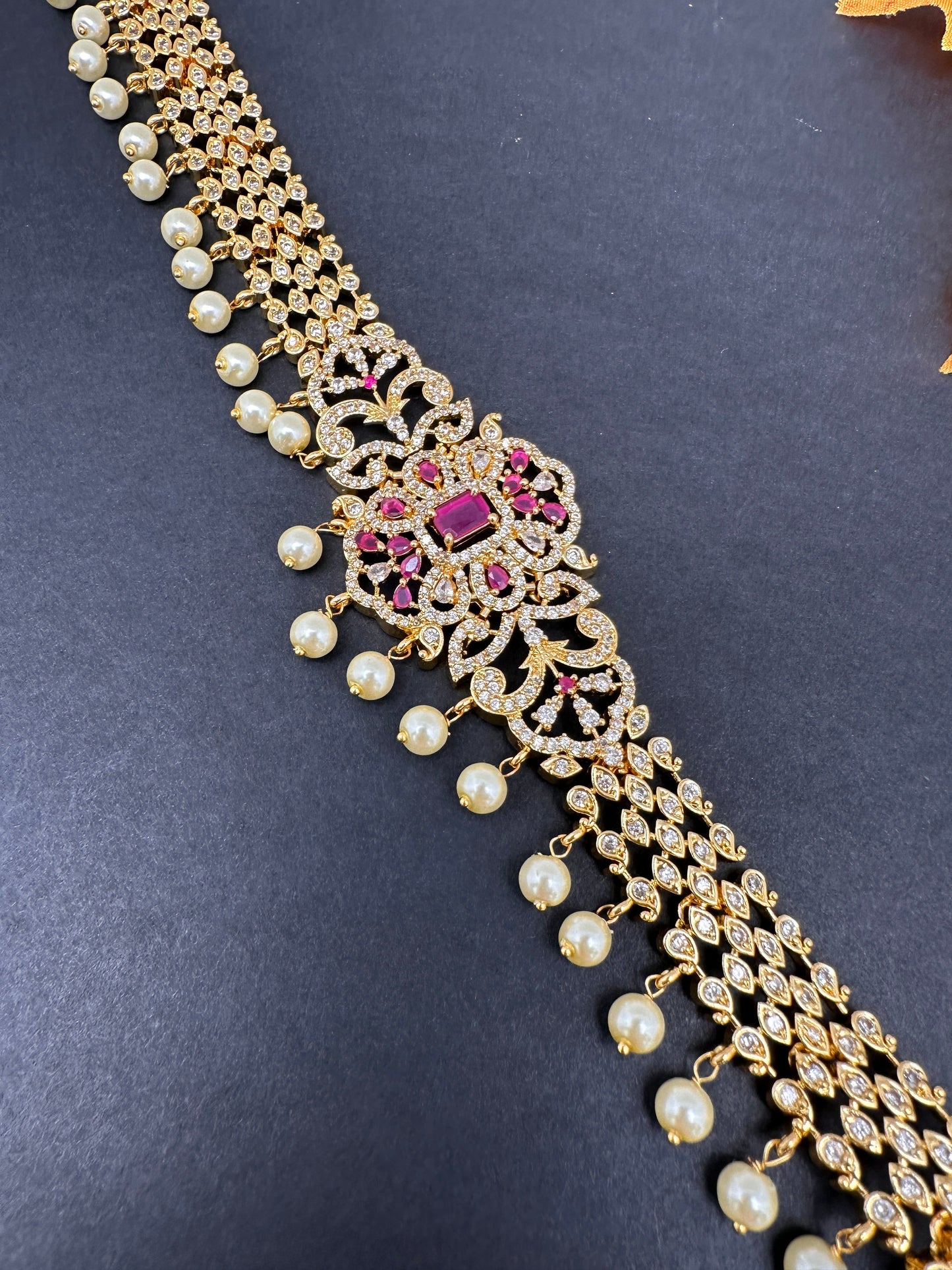 Sleek CZ Red Stone Hip Chain Vaddanam