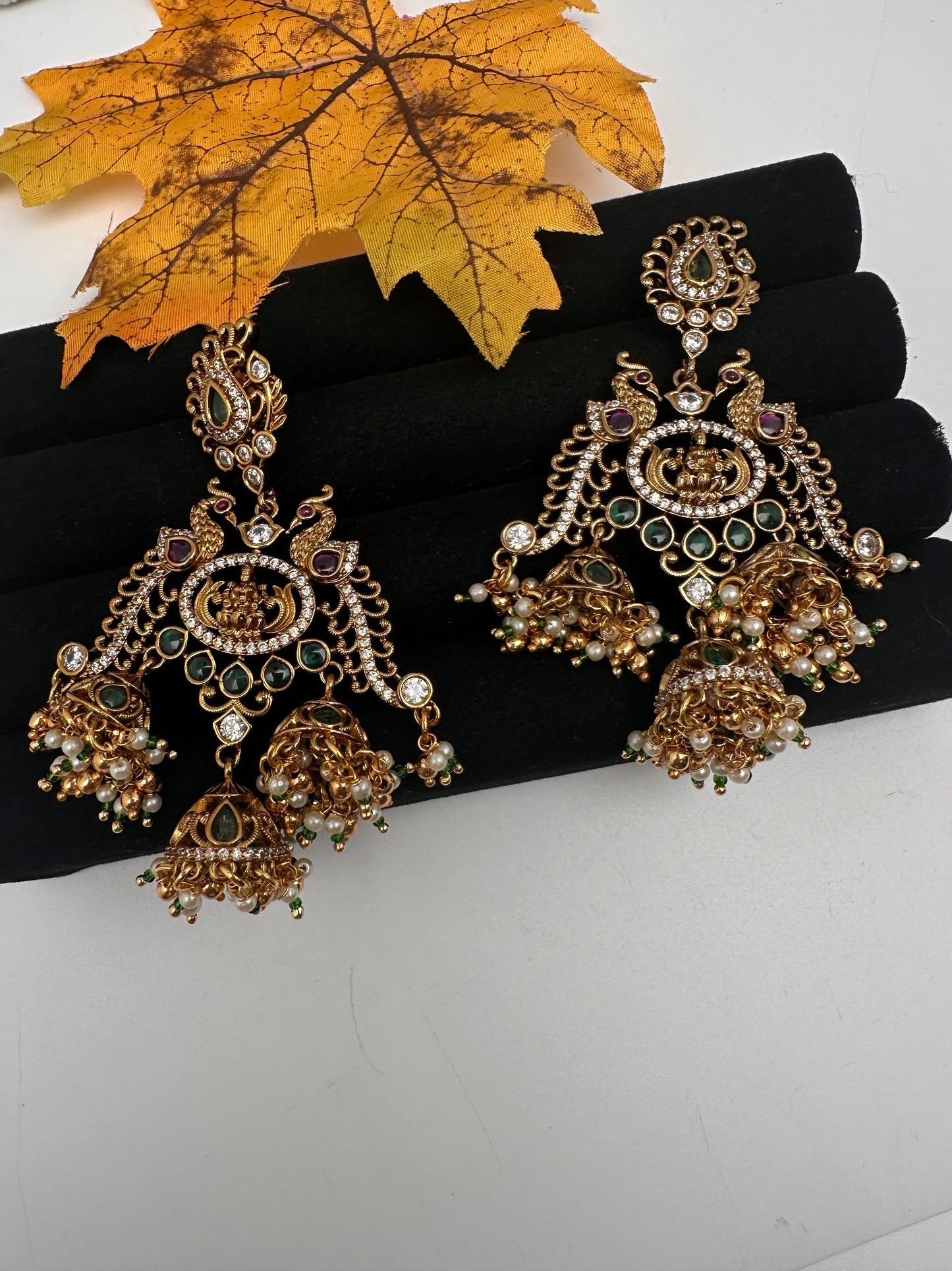 Matte Kempu Peacock Jhumka Earrings