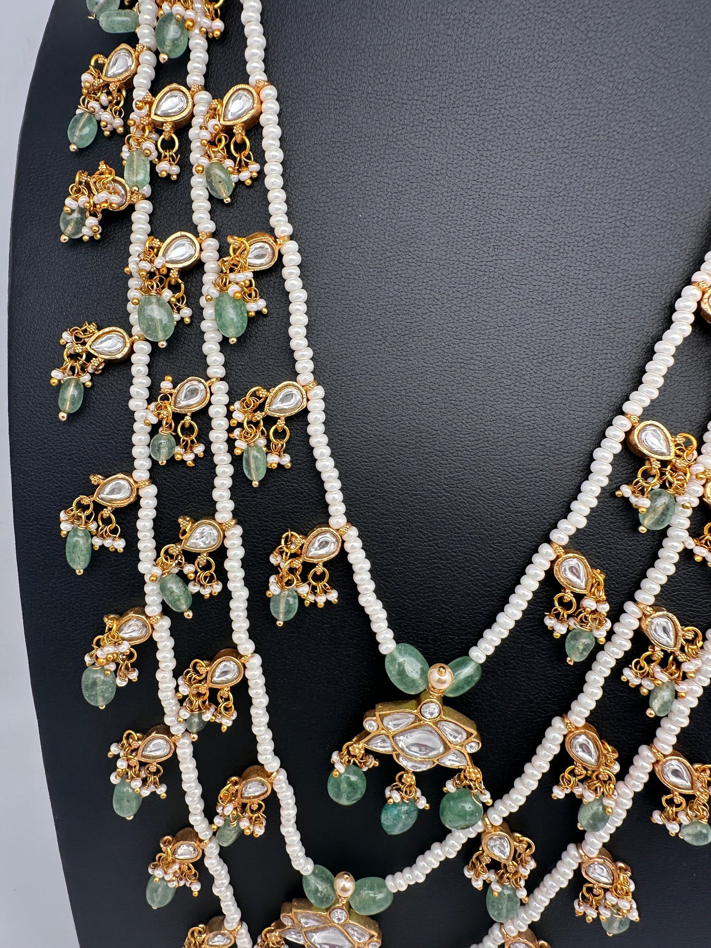 Jadau Kundan Multi Layer Teen Lada Pearl Necklace