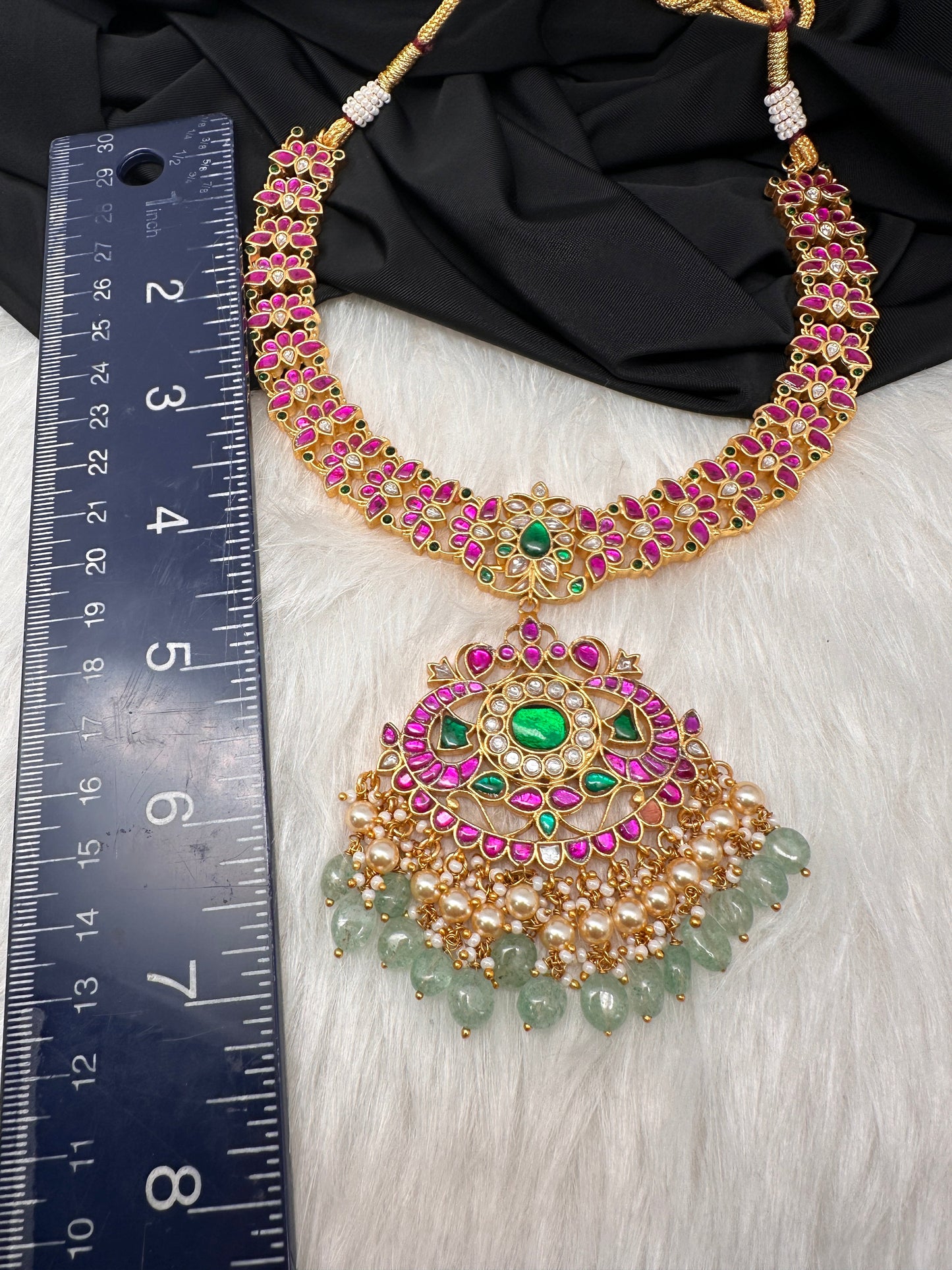 Jadau Kundan Goddess Lakshmi Short Neckline Necklace with Emerald Beads