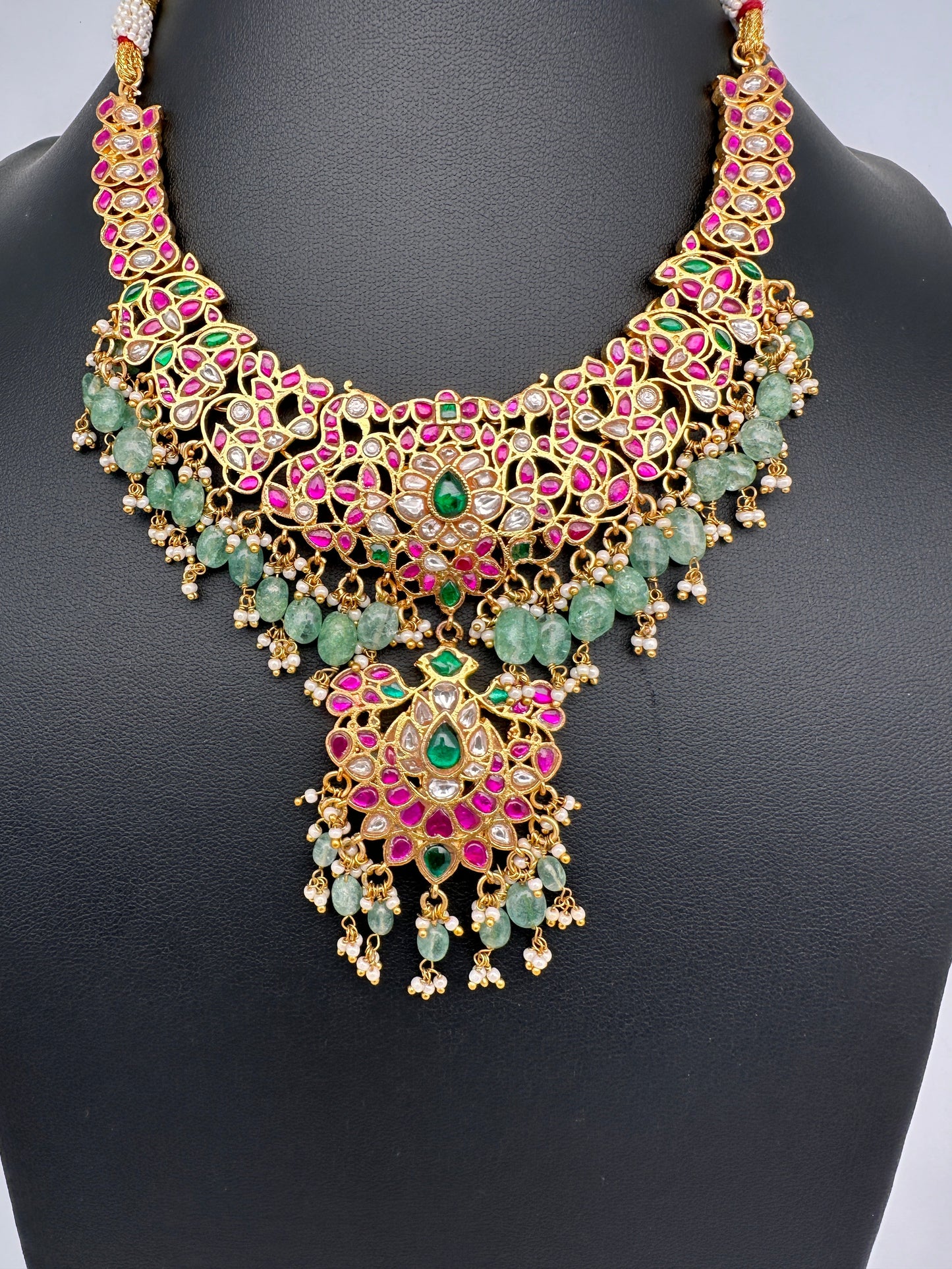 Jadau Kundan Daint Neckline Necklace with Green Emerald Beads