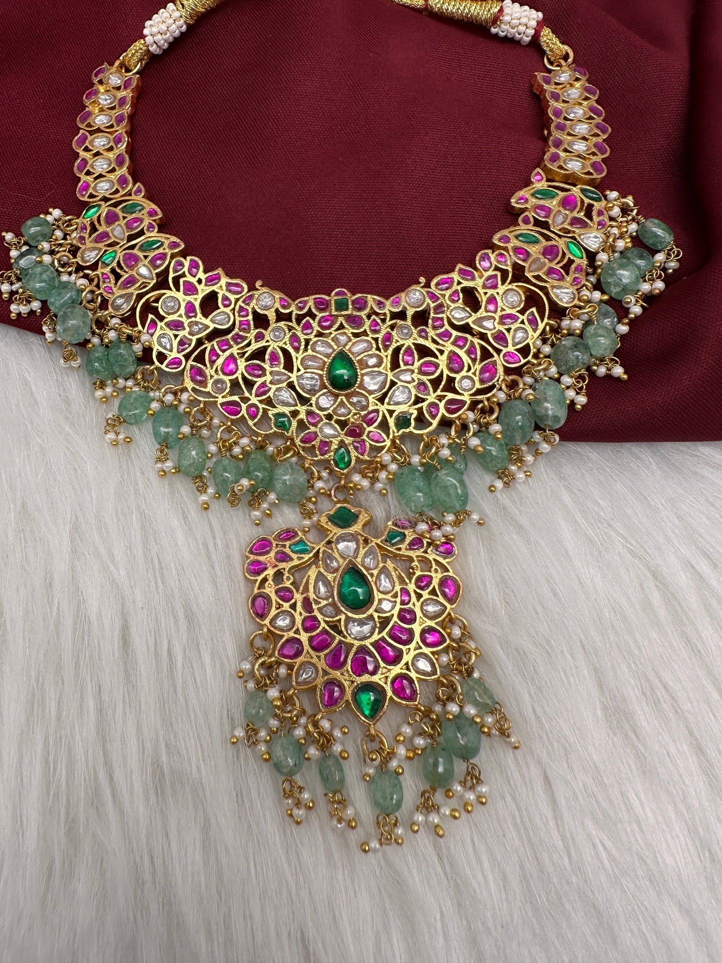 Jadau Kundan Daint Neckline Necklace with Green Emerald Beads