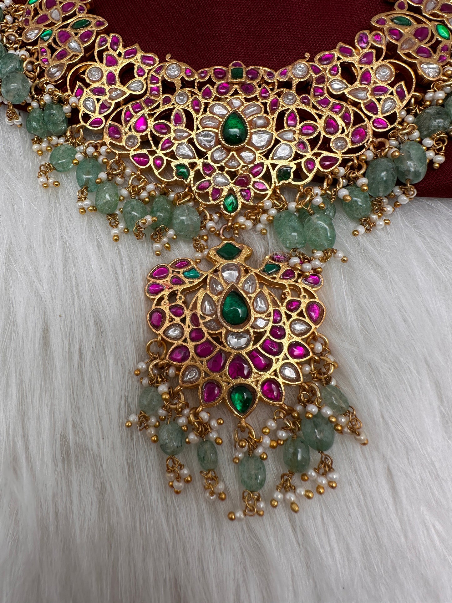Jadau Kundan Daint Neckline Necklace with Green Emerald Beads