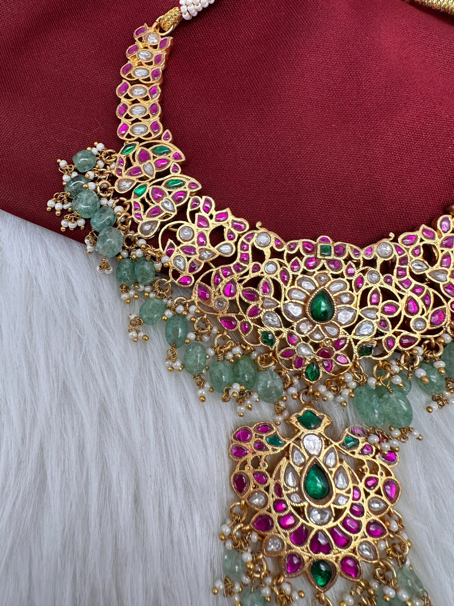 Jadau Kundan Daint Neckline Necklace with Green Emerald Beads