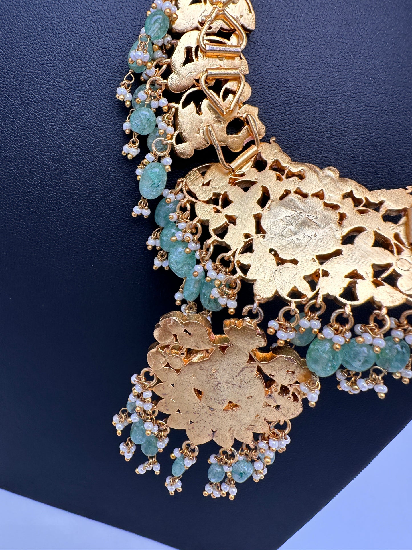 Jadau Kundan Daint Neckline Necklace with Green Emerald Beads