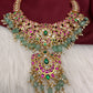 Jadau Kundan Daint Neckline Necklace with Green Emerald Beads