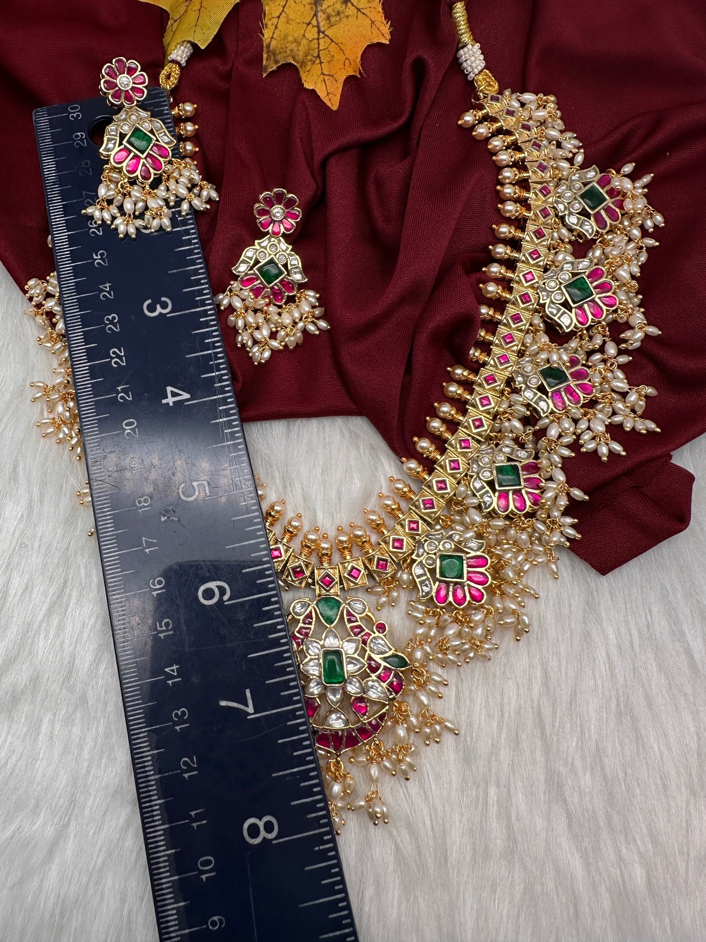 Rice Pearls Jadau Kundan Mid length Guttapusalu Necklace
