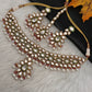 Kundan Statement Choker comes with Earrings and Mang Tika