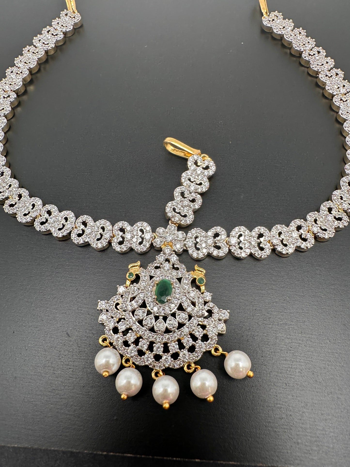 Red Ruby Diamond FinishPeacock Maangteeka Mathapatti with Red Stone
