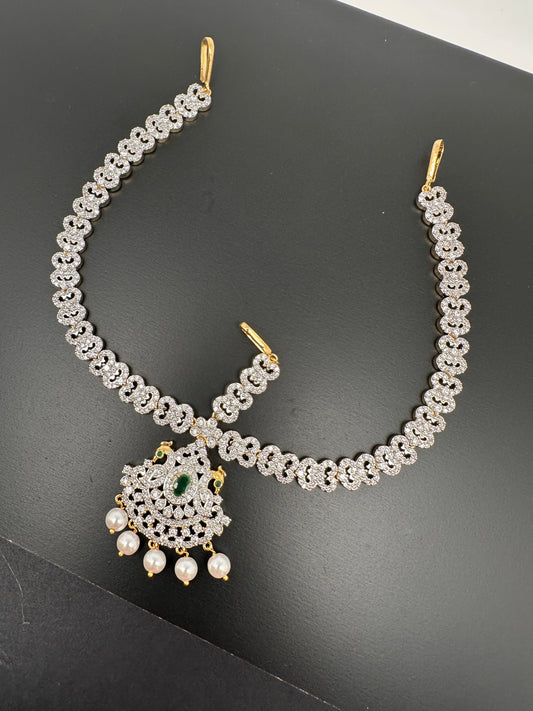 Red Ruby Diamond FinishPeacock Maangteeka Mathapatti with Red Stone