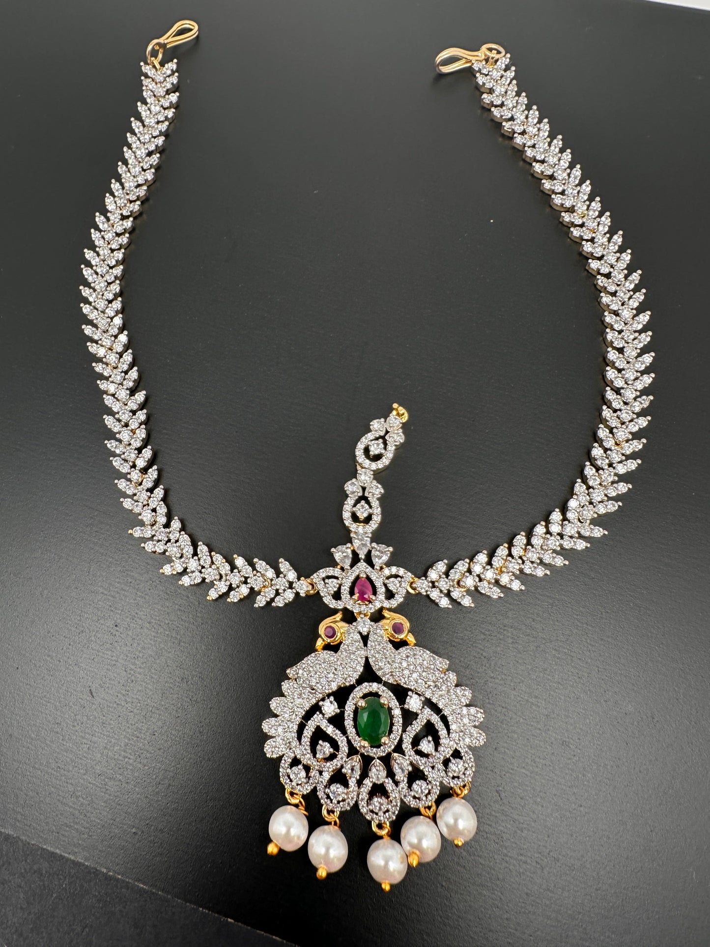 Emerald Ruby Diamond FinishPeacock Maangteeka Mathapatti with Red Stone