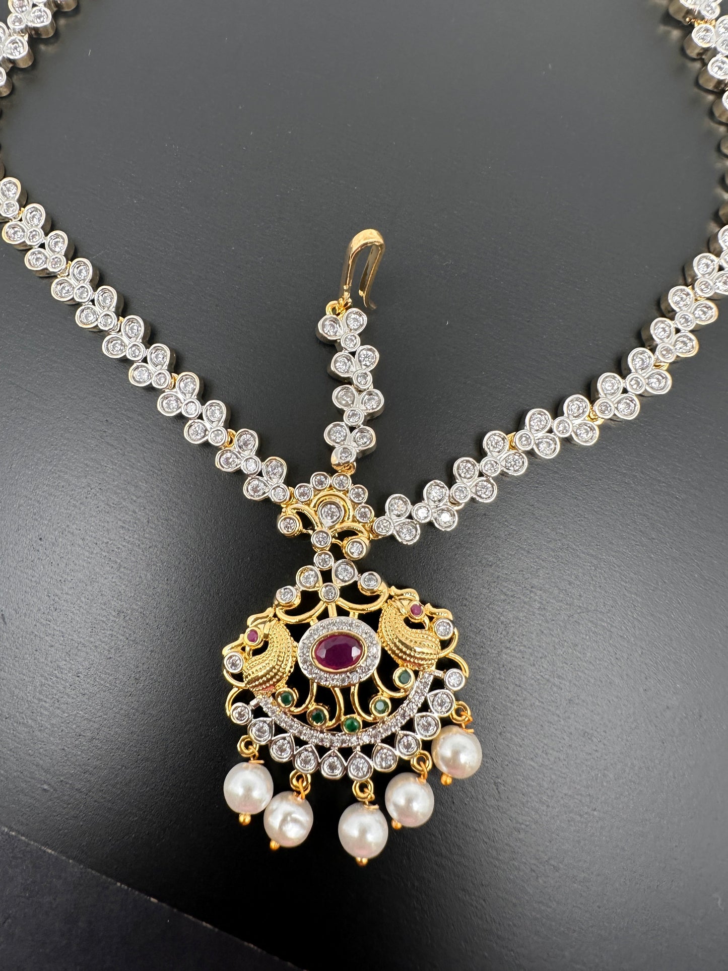 Emerald Ruby Dual Tone Peacock Maangteeka Mathapatti with Red Stone