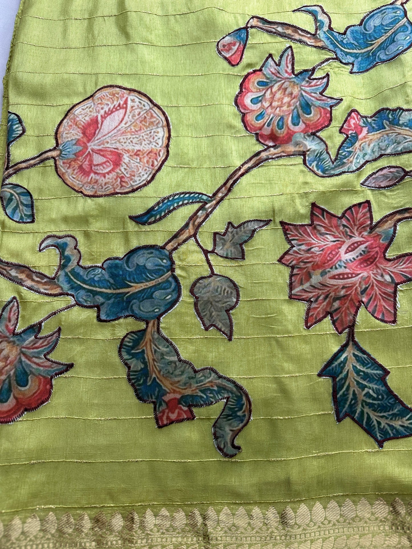 Kalamkari Patch Semi Crepe Green Saree comes with 2 Blouses