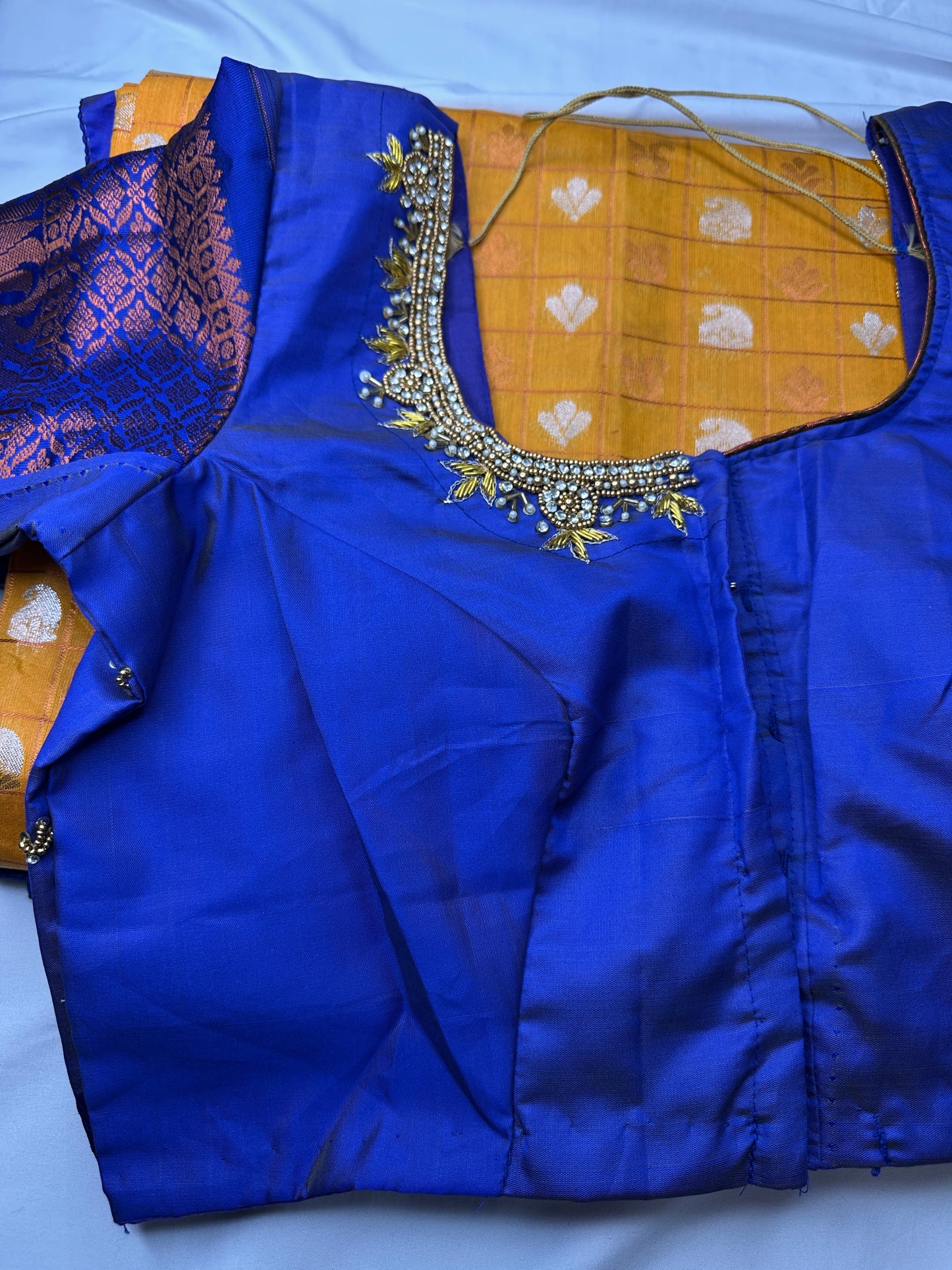 Orange and Blue Semi Kuppdam Saree