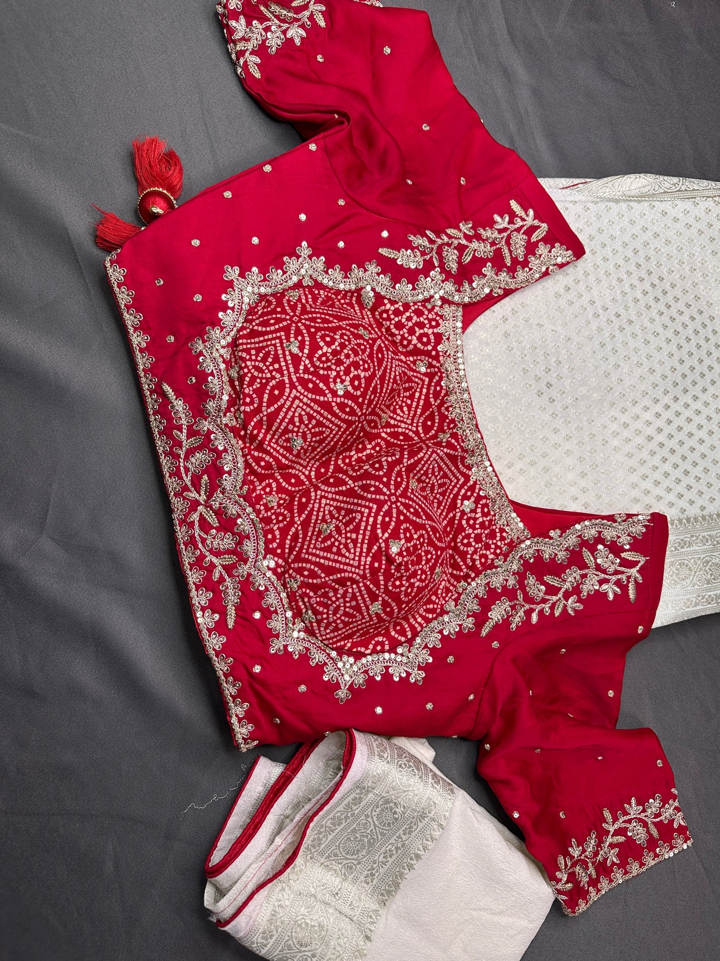 White Saree with Red Saree and a blouse piece