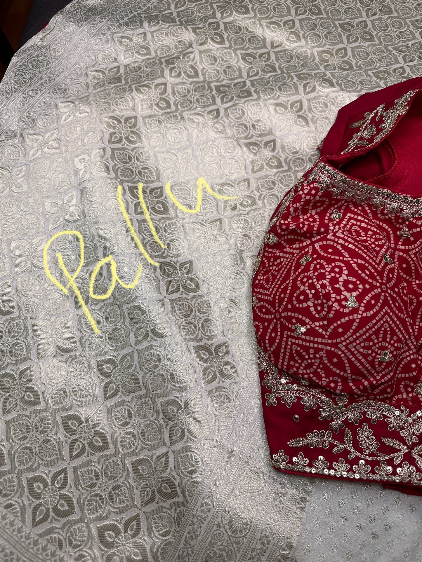 White Saree with Red Saree and a blouse piece